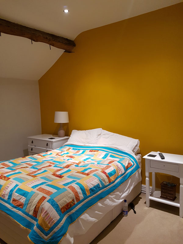Painted yellow bedroom Derby