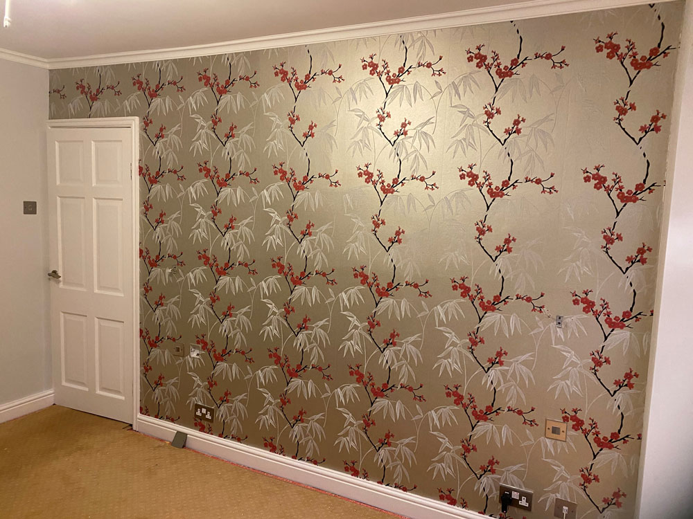 Spondon wallpapered bedroom wall (after)